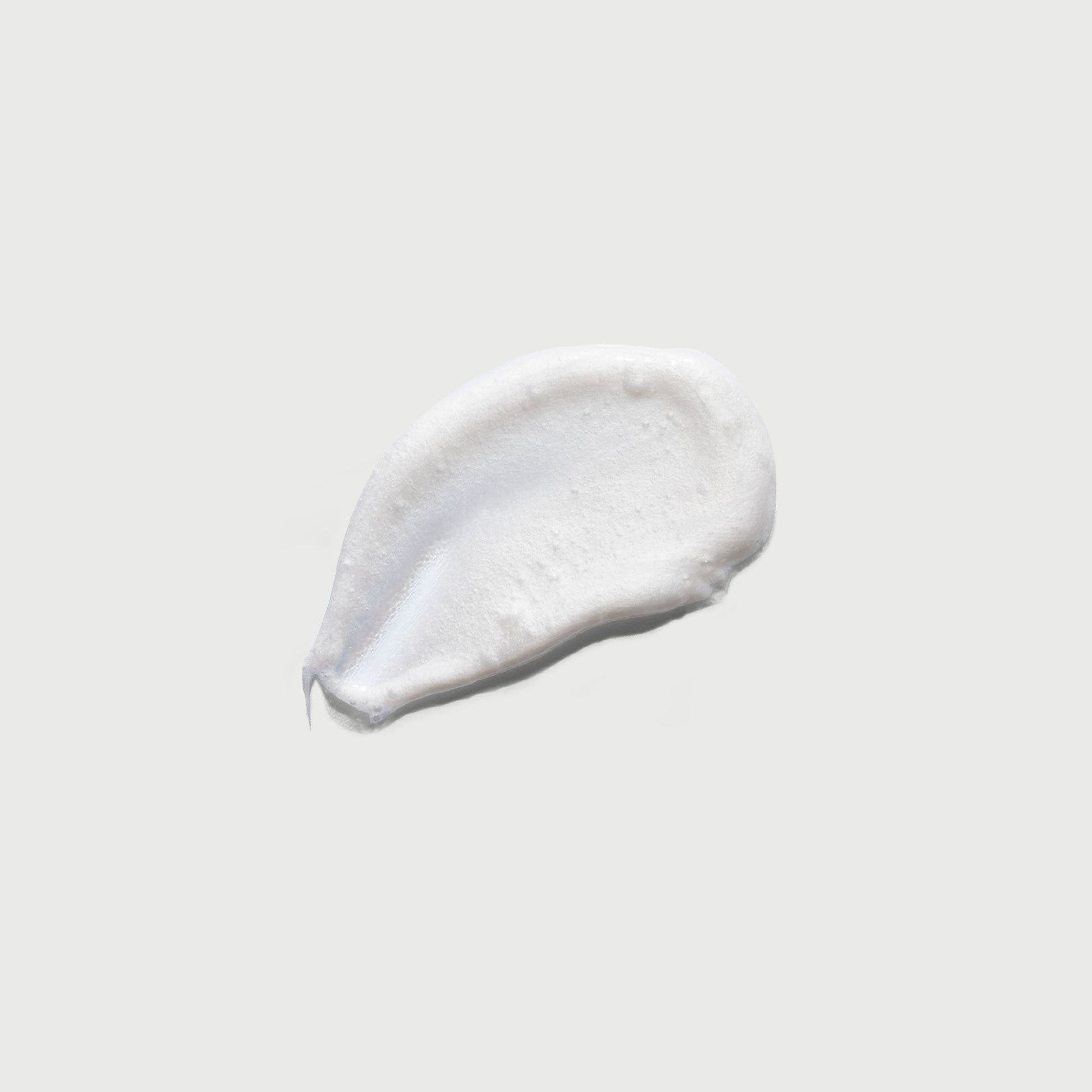 the-smoother-glycolic-acid-exfoliating-body-wash-f1 NATR-40002-Swatch-The-Smoother-Glycolic-Acid-Exfoliating-Body-Wash-bonebkgd.jpg