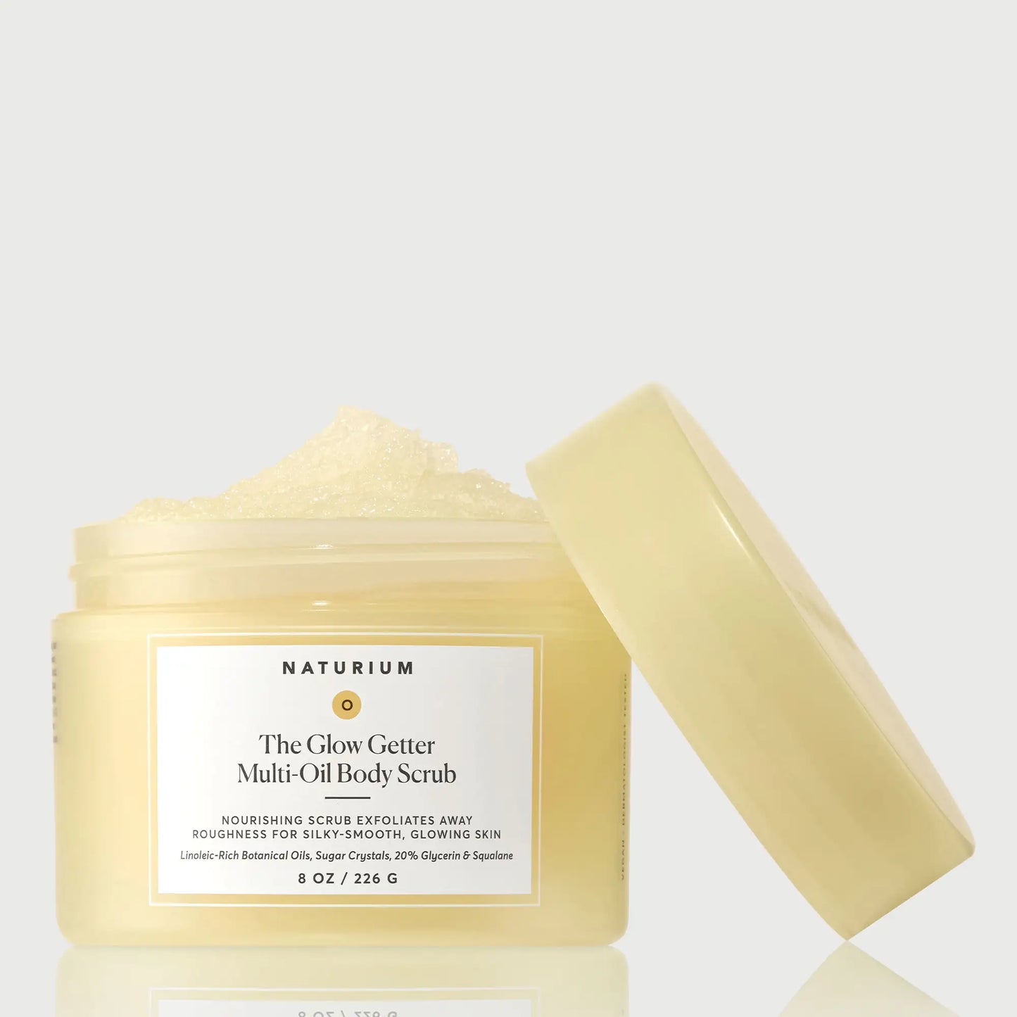 the-glow-getter-multi-oil-body-scrub-y2 NATR-40028-GlowGetter-Multi-Oil-Body-Scrub-Front-CapOff-bonebkgd.webp