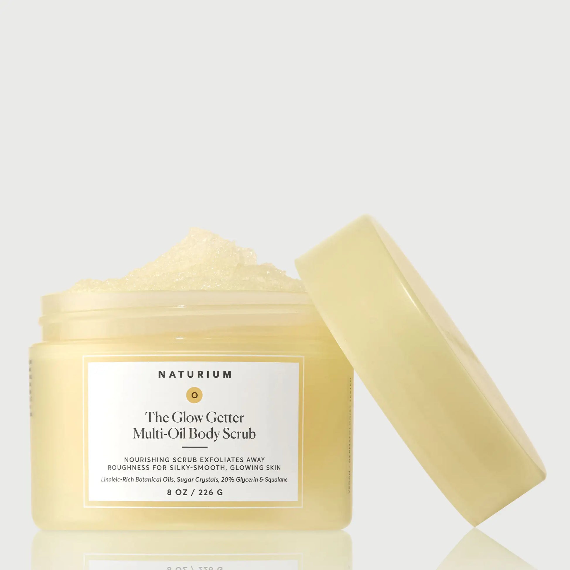 the-glow-getter-multi-oil-body-scrub-y2 NATR-40028-GlowGetter-Multi-Oil-Body-Scrub-Front-CapOff-bonebkgd.webp