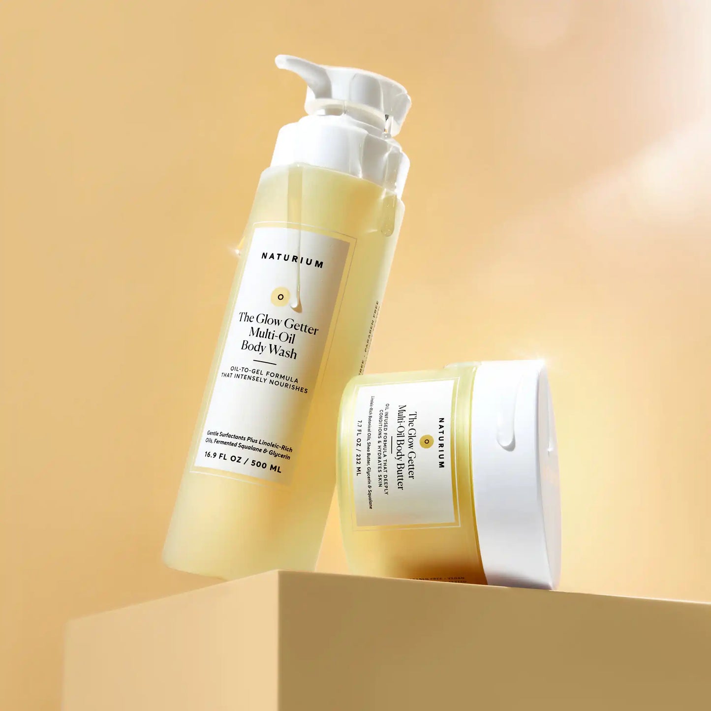 the-glow-all-out-body-bundle-b4 gg-bodybutter_1464-crop_revcolor_FL.webp